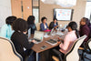 Modern corporate conference room with advanced AV technology for hybrid meetings