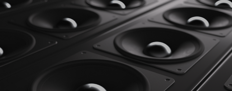 Image of speakers with text about audio integration in hospitality projects.