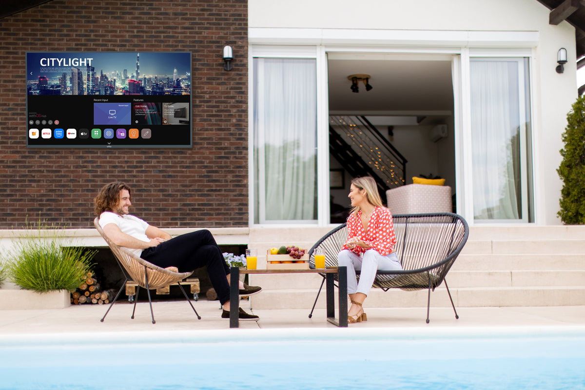Peerless-AV BWPTV554 outdoor TV lifestyle application with people