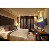 Peerless-AV HA746-STB Hospitality Wall Arm Mount installed in hotel room