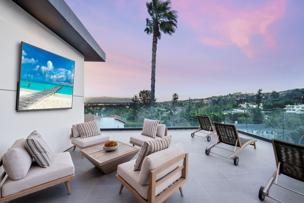 Peerless-AV NT75PS1K Neptune Partial Sun outdoor TV installed on covered patio