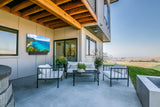 Peerless-AV Neptune NTSB150 outdoor soundbar in shaded outdoor living space